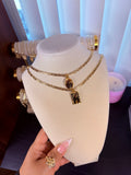 Virgin/prayer necklace