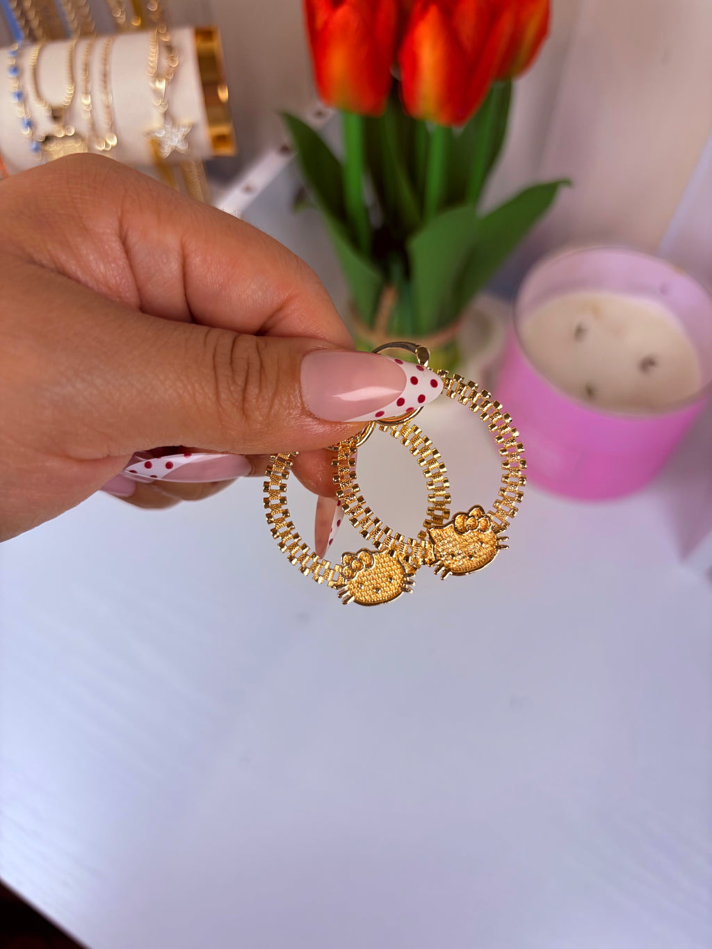 HK face Rollie earrings