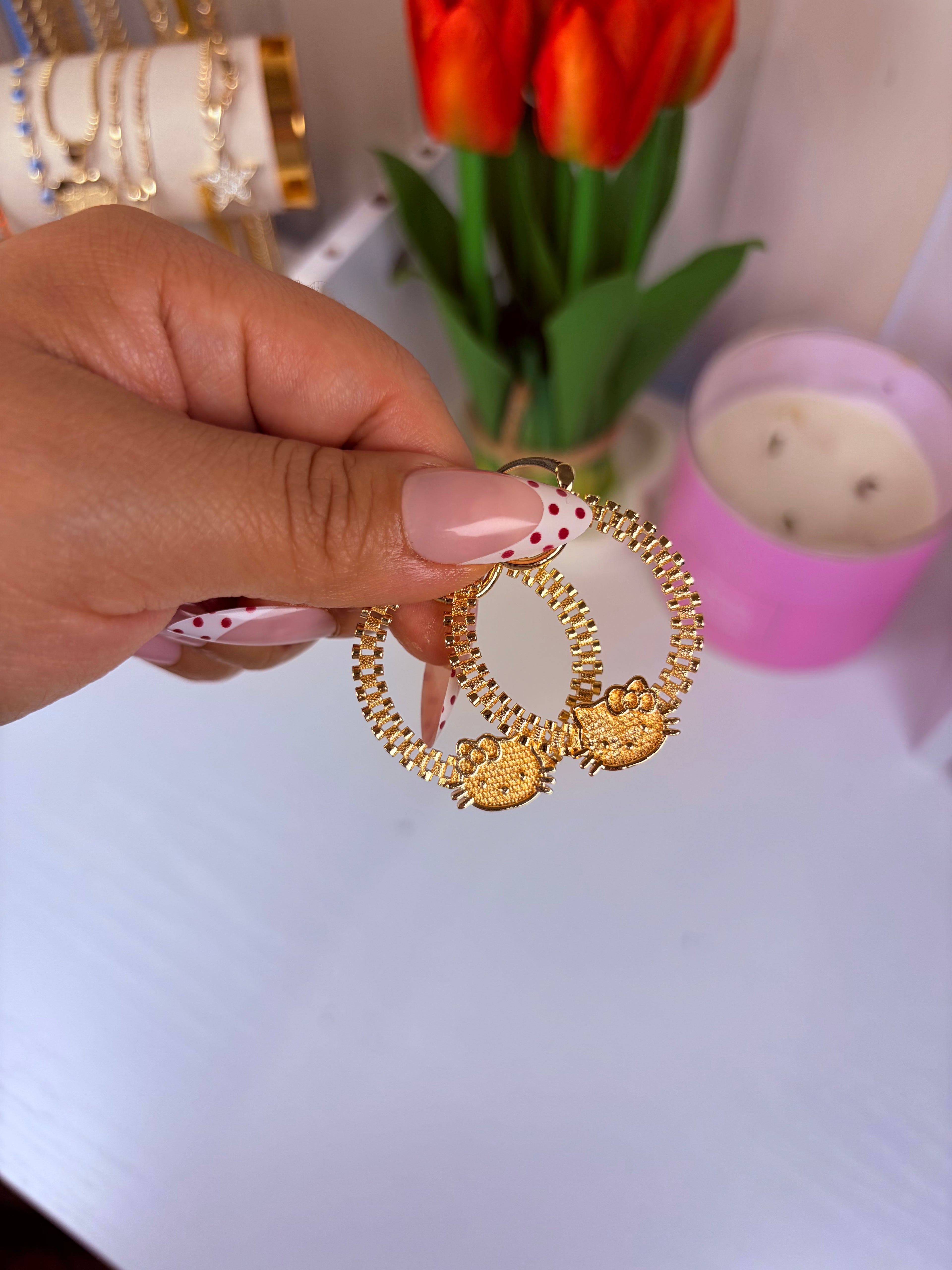 HK face Rollie earrings