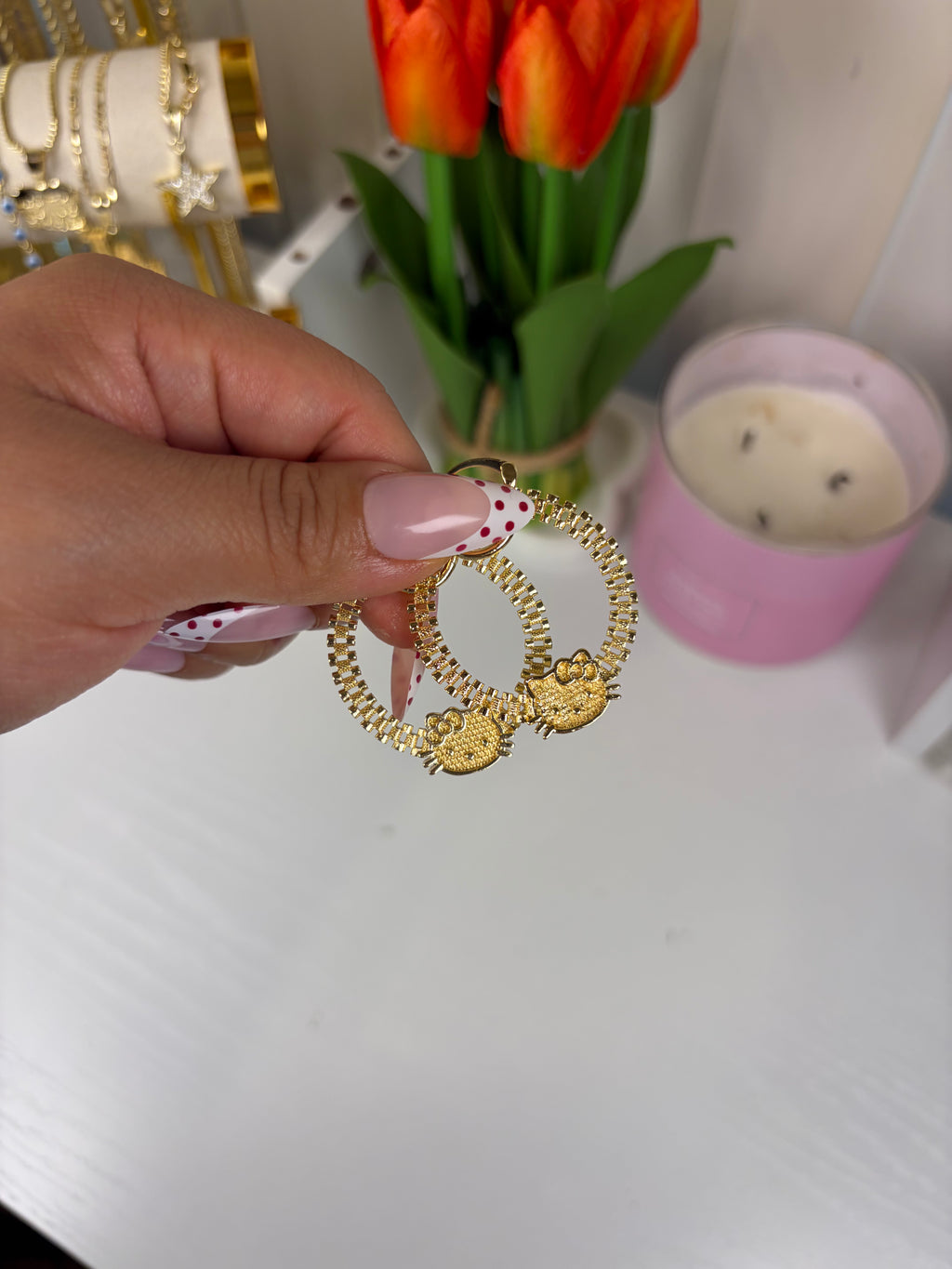 HK face Rollie earrings